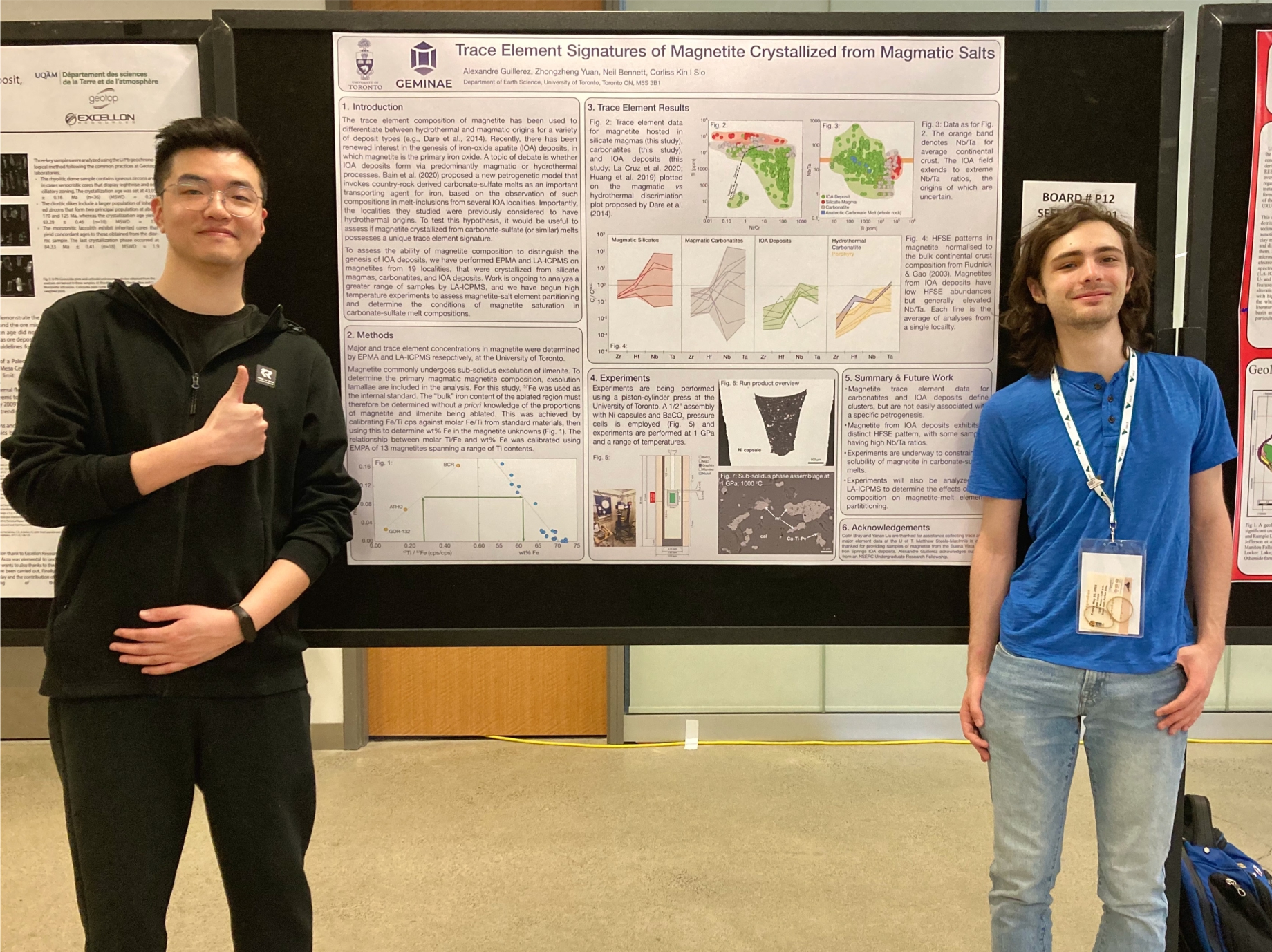 BSc student Alex Guillerez and grad student Zhongzheng Yuan standing beside the winning poster.