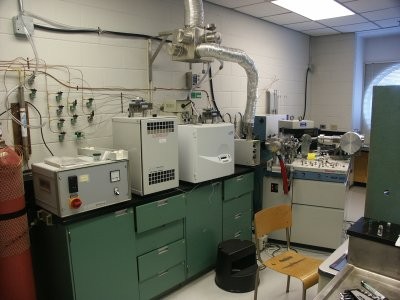 a science lab with a variety of machines and tubing