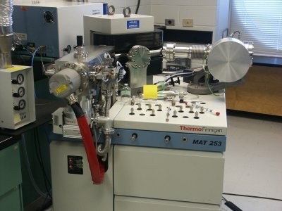 a close view of a large scientific mass spectrometer instrument
