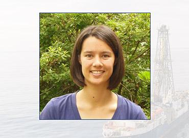 headshot of woman in front of trees over an image of a research ship